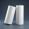 Two rolls of velvet soft-touch matte APET plastic film standing side by side